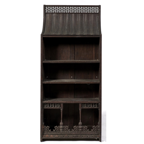 Appraisal: A Victorian oak 'Indian' bookcase in the manner of Liberty