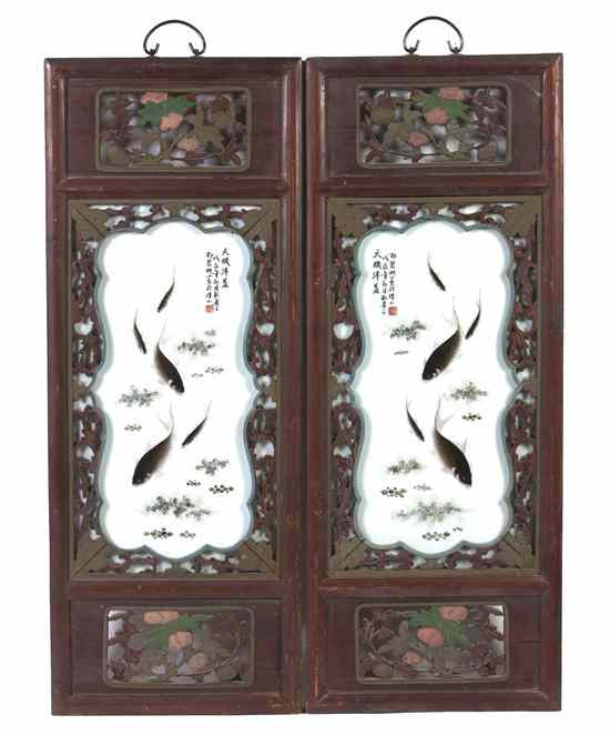 Appraisal: A Pair of Porcelain Plaques depicting fish mounted on wood