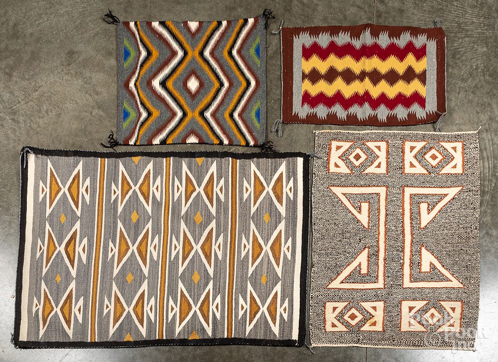 Appraisal: Four Navajo Indian style rugs Four Navajo style rugs largest