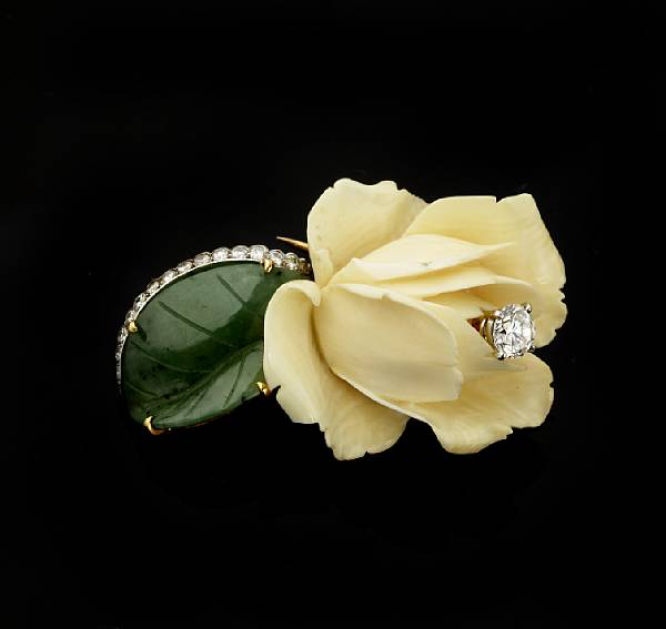 Appraisal: A diamond ivory and jade clip-brooch Cartier Paris signed Cartier