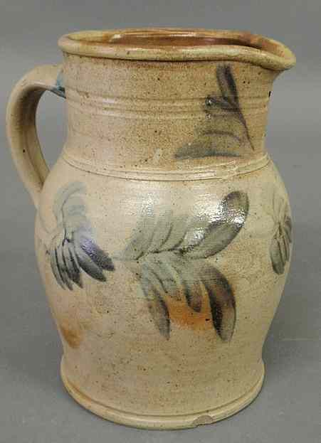 Appraisal: Pennsylvania stoneware pitcher th c with blue floral decoration h