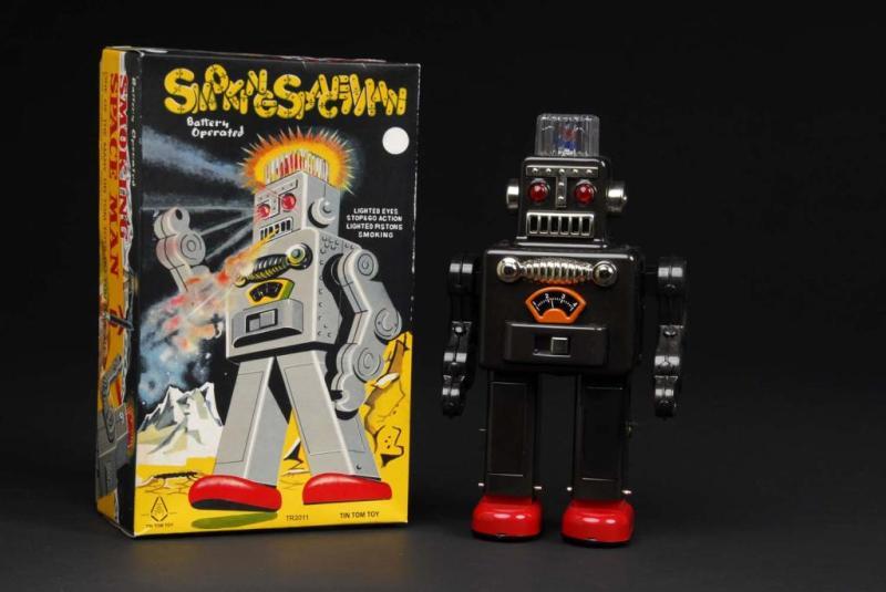 Appraisal: Contemporary Smoking Spaceman Toy Description Japanese Made by Tin Tom