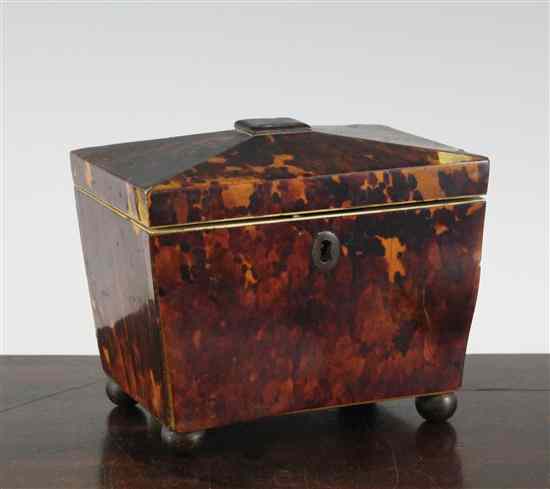 Appraisal: A th century blonde tortoiseshell tea caddy of sarcophagus form