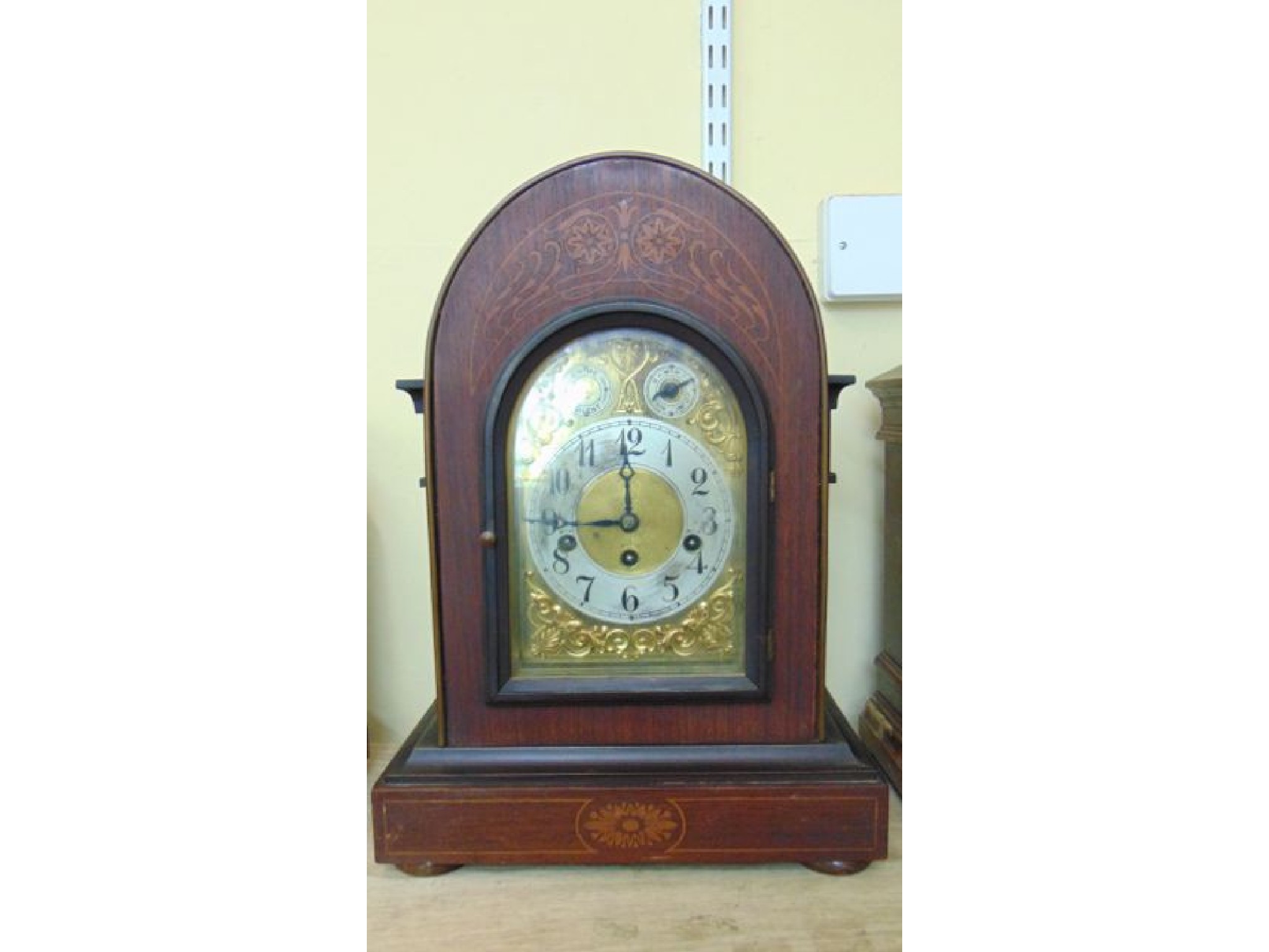 Appraisal: An inlaid Edwardian rosewood and marquetry bracket clock with arched