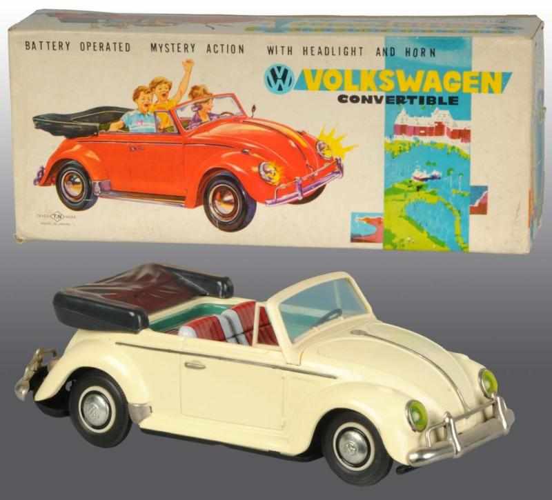 Appraisal: Tin Volkswagen Convertible Battery-Op Toy Description Japanese Circa s Made