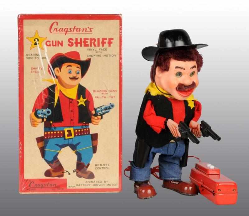 Appraisal: Lot of Tin Sheriff Battery-Operated Toys Description Japanese Working Includes