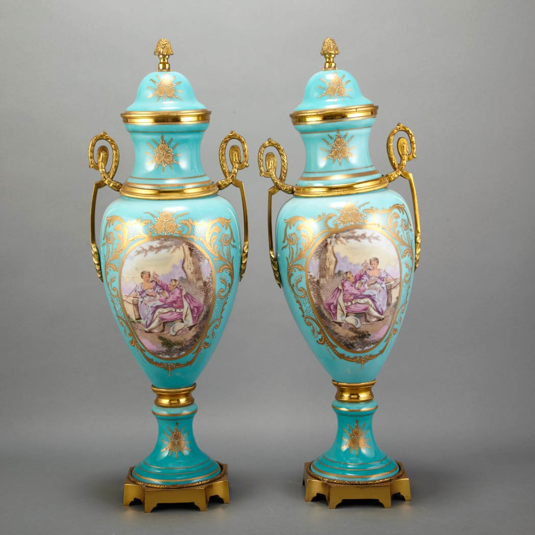 Appraisal: Pair of Sevres Style Gilt-Metal Mounted Porcelain Covered Urns th