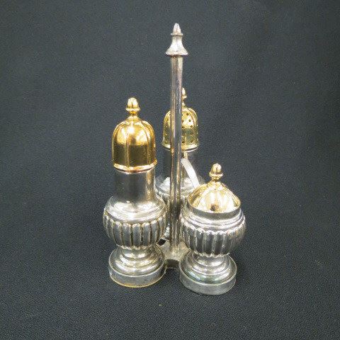 Appraisal: Silverplate Condiment Set salt pepper and mustard in holder