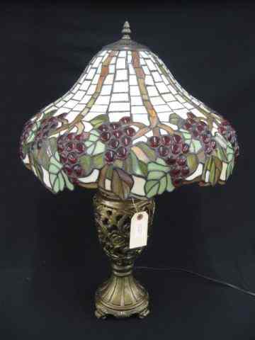 Appraisal: Leaded Glass Lamp grape and vinedecorated '' diameter shade openwork