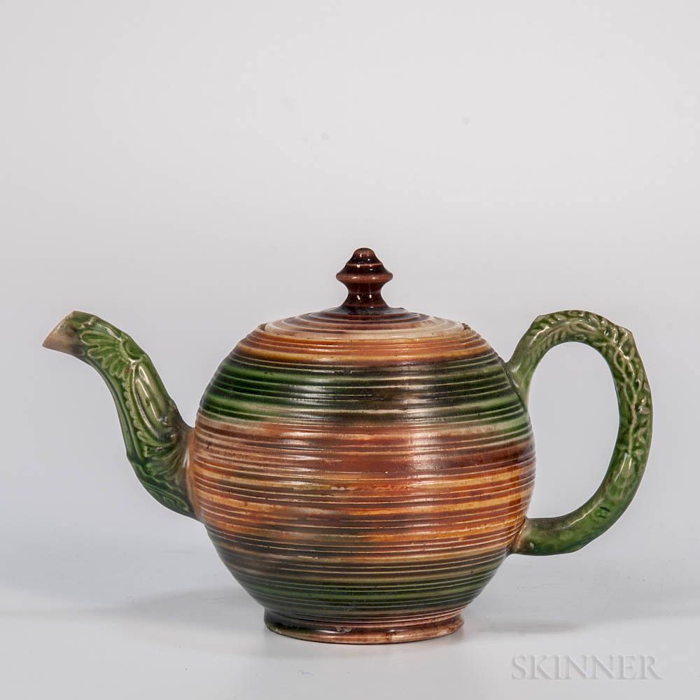 Appraisal: Staffordshire Lead-glazed Creamware Teapot and Cover Staffordshire Lead-glazed Creamware Teapot