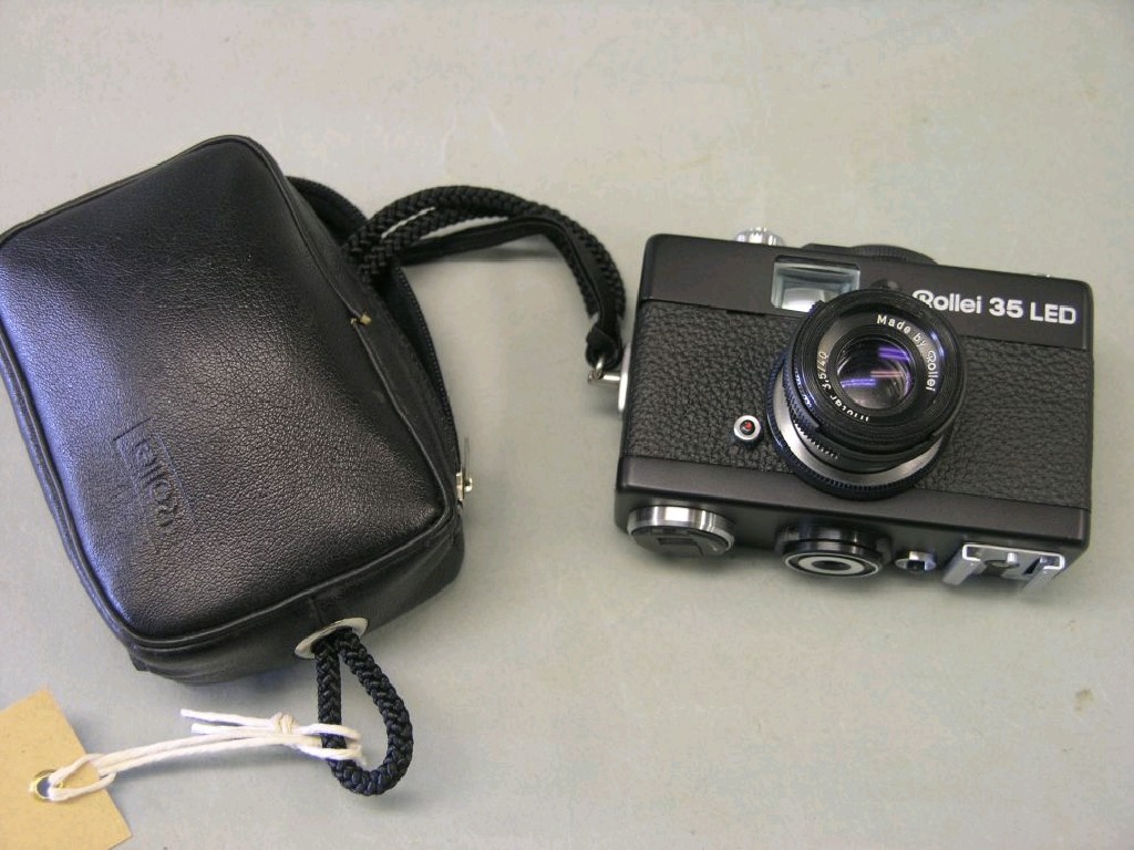 Appraisal: A Rollei mm LED compact camera in pouch - good