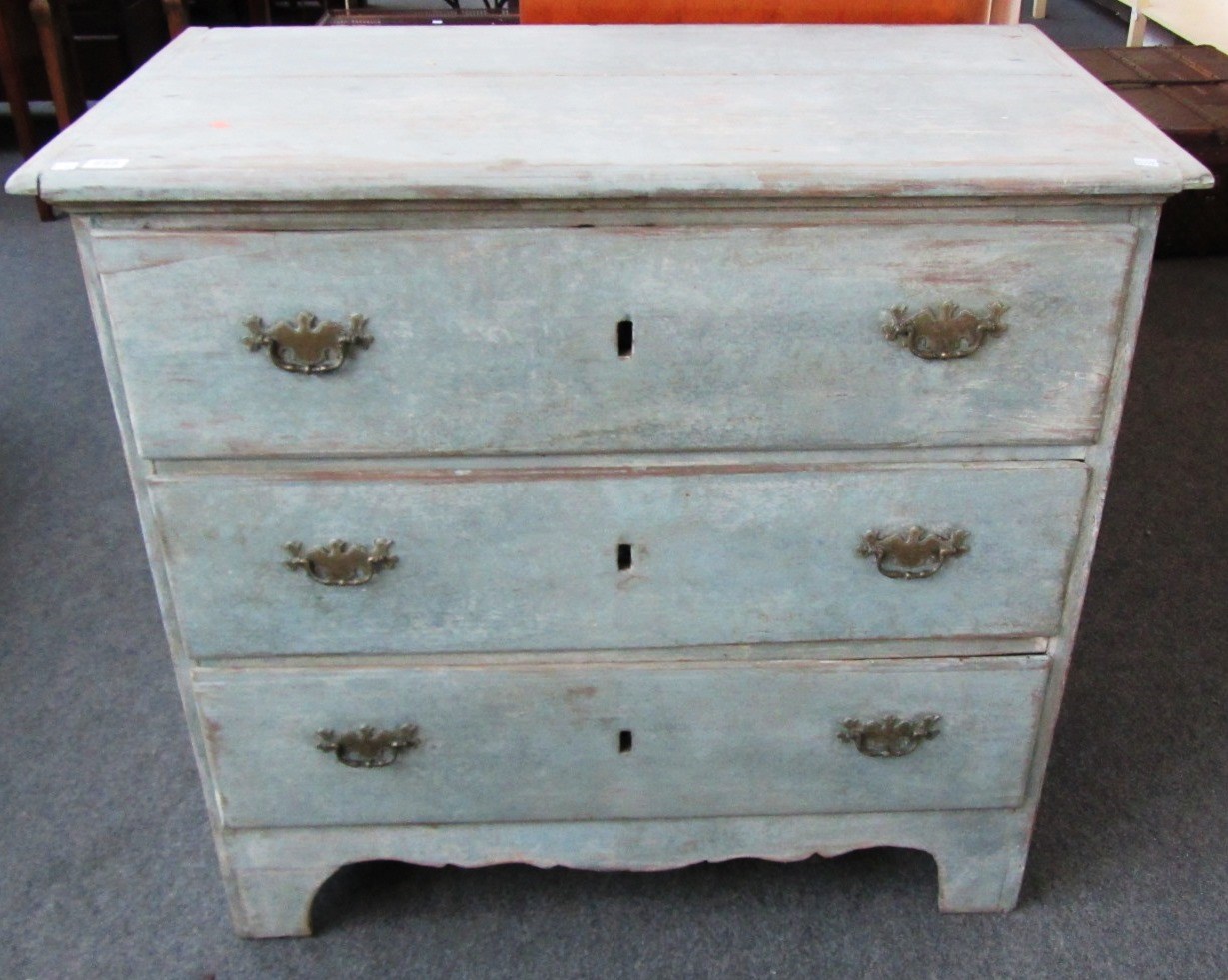 Appraisal: An th century blue painted pine chest of three drawers