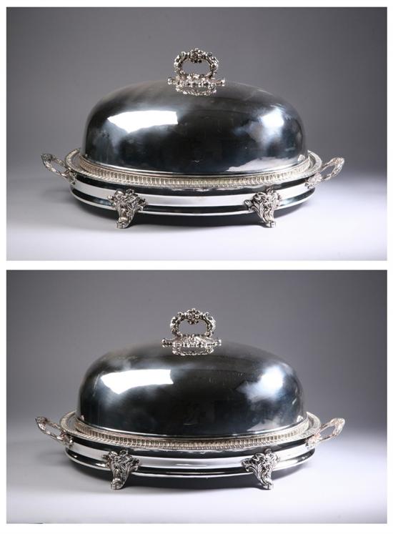 Appraisal: PAIR GRAND EDWARDIAN SHEFFIELD PLATE OVAL COVERED CHAFING DISHES Circa