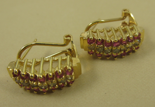 Appraisal: PAIR OF RUBY AND DIAMOND EARRINGS each k yellow gold