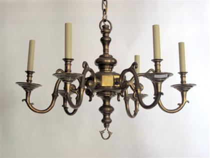 Appraisal: Brass chandelierHaving scrolled arms and six lights