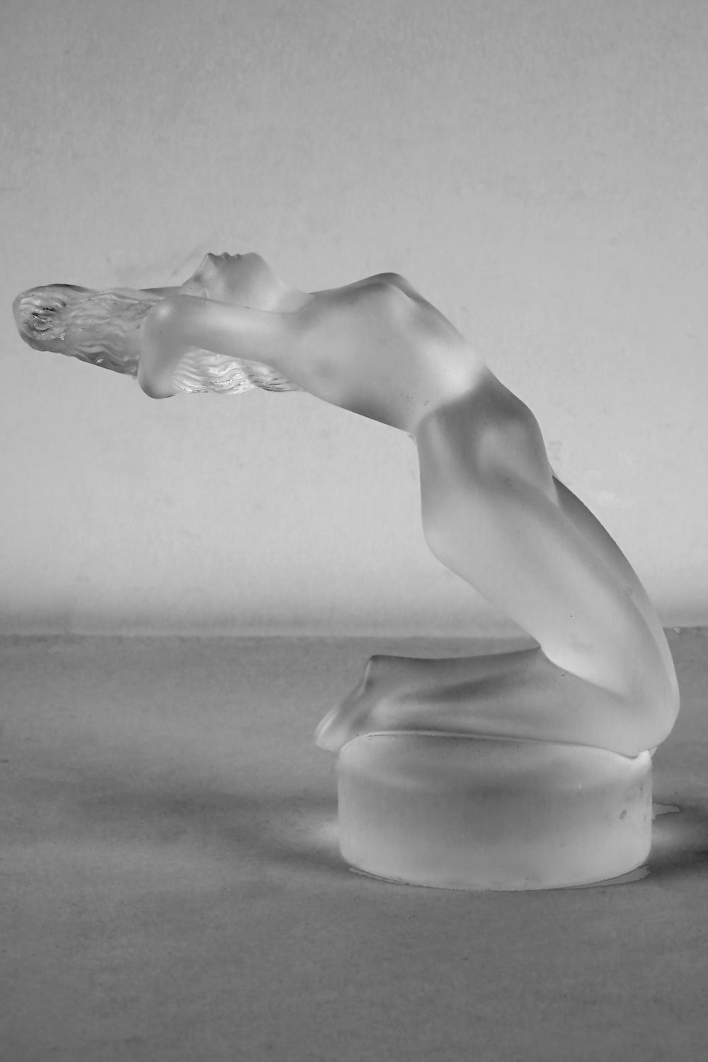 Appraisal: LALIQUE MOLDED GLASS NUDE FIGUREsigned to underside inches wide inches