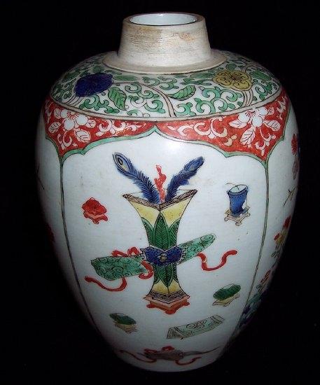 Appraisal: A famille verte ovoid jar lacking cover decorated alternating reserves