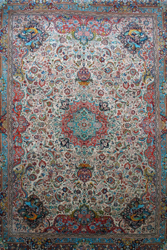 Appraisal: ORIENTAL HAND KNOTTED SILK CARPET Persian Isfahan design medallion and