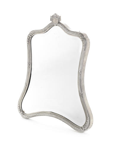 Appraisal: A metalware mounted dressing table mirror bearing pseudo Russian Faberg