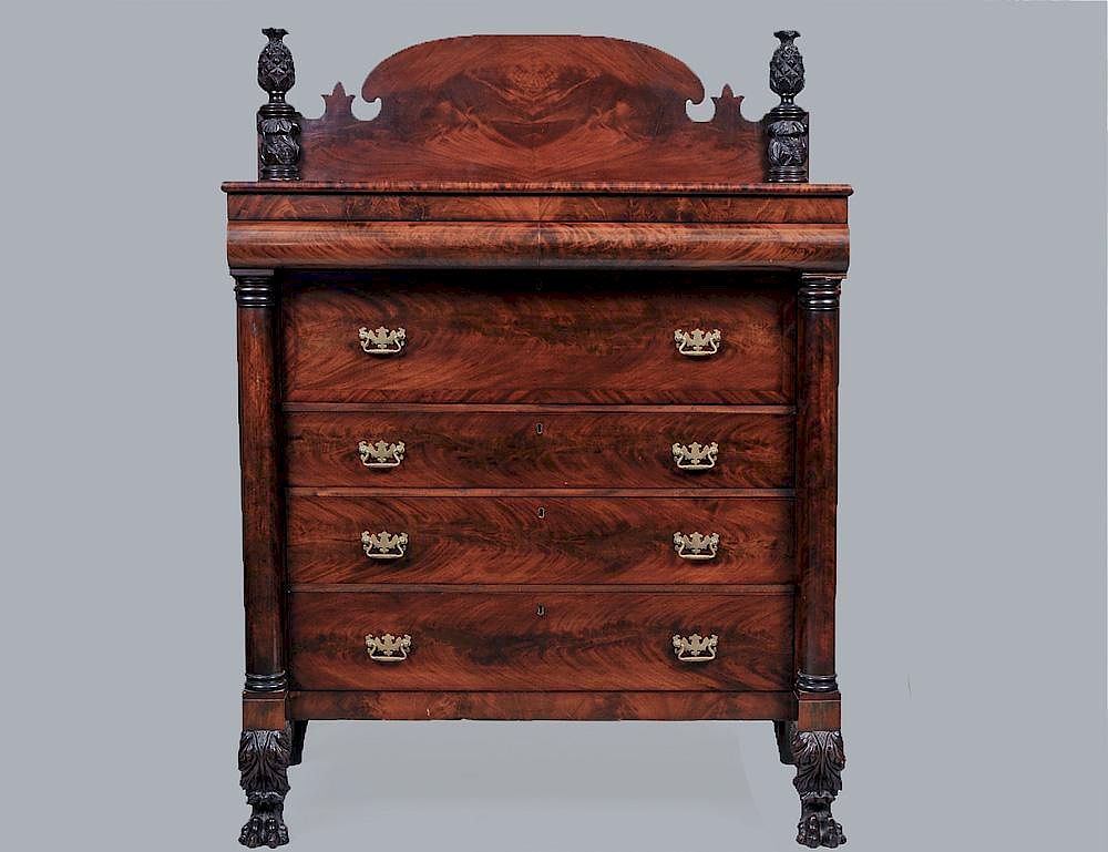 Appraisal: EMPIRE FIGURAL MAHOGANY CHEST OF DRAWERS American Circa With shaped