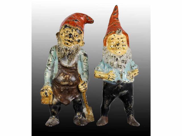 Appraisal: Lot of Gnome Cast Iron Doorstops Description Gnome with shovel