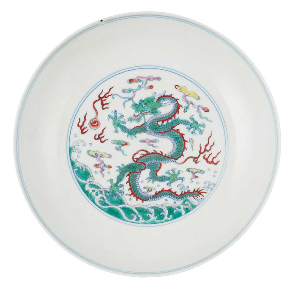 Appraisal: DOUCAI 'DRAGON' DISH YONGZHENG MARK thinly potted painted with dragons