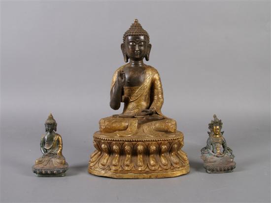 Appraisal: A Group of Two Gilt Metal Models of Buddha Height