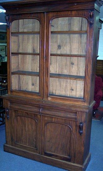 Appraisal: A mid Victorian mahogany bookcase with moulded cornice above a