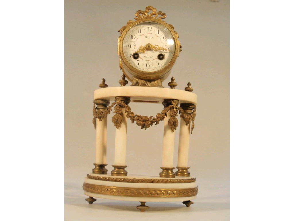 Appraisal: A thC French gilt metal and white alabaster clock by