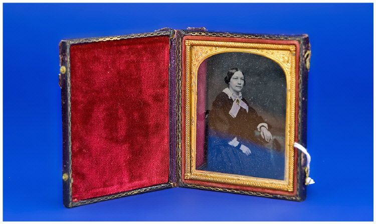 Appraisal: Leather Cased Daguerreotype Portrait Of An Older Woman