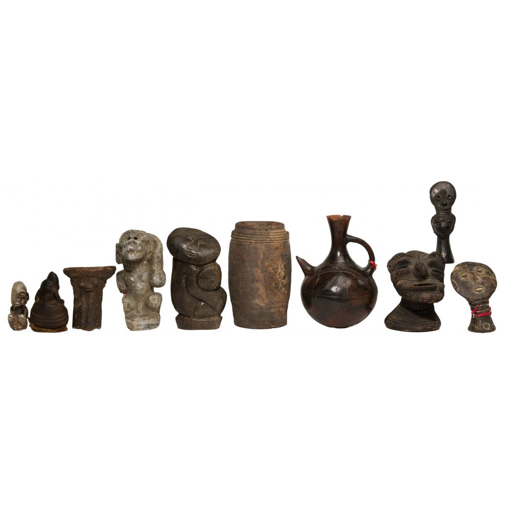 Appraisal: ETHNOGRAPHIC CARVED STONE AND POTTERY ASSORTMENT items including Oceanic heads