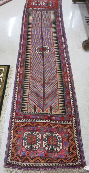 Appraisal: PERSIAN BELOUCHI TRIBAL RUNNER hand knotted ' x '