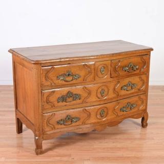 Appraisal: Louis XV provincial carved fruitwood commode th c serpentine front