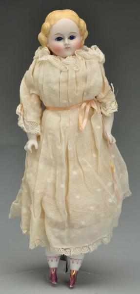 Appraisal: Charming Parian Child Doll with Glass Eyes Description German parian