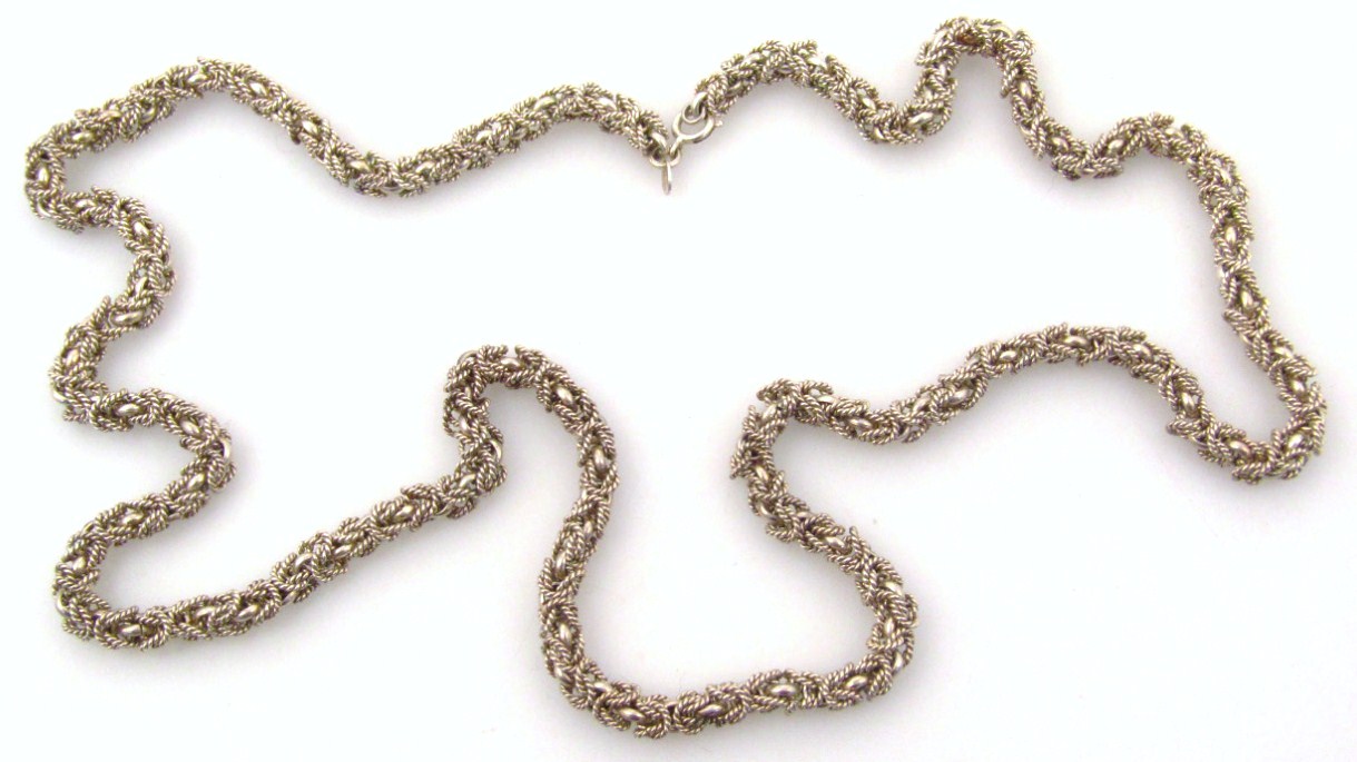 Appraisal: A ropetwist necklace of elaborate design with entwined filigere and