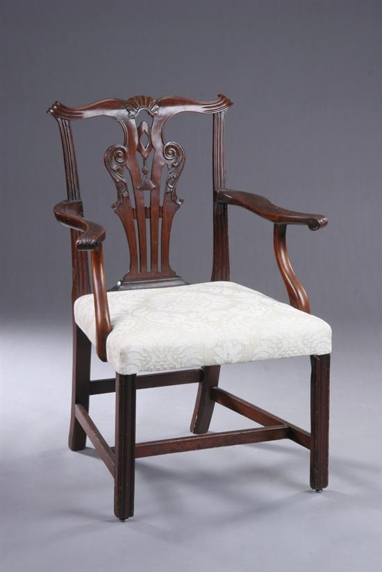 Appraisal: GEORGE III CHIPPENDALE OPEN ARMCHAIR th century Serpentine crest with