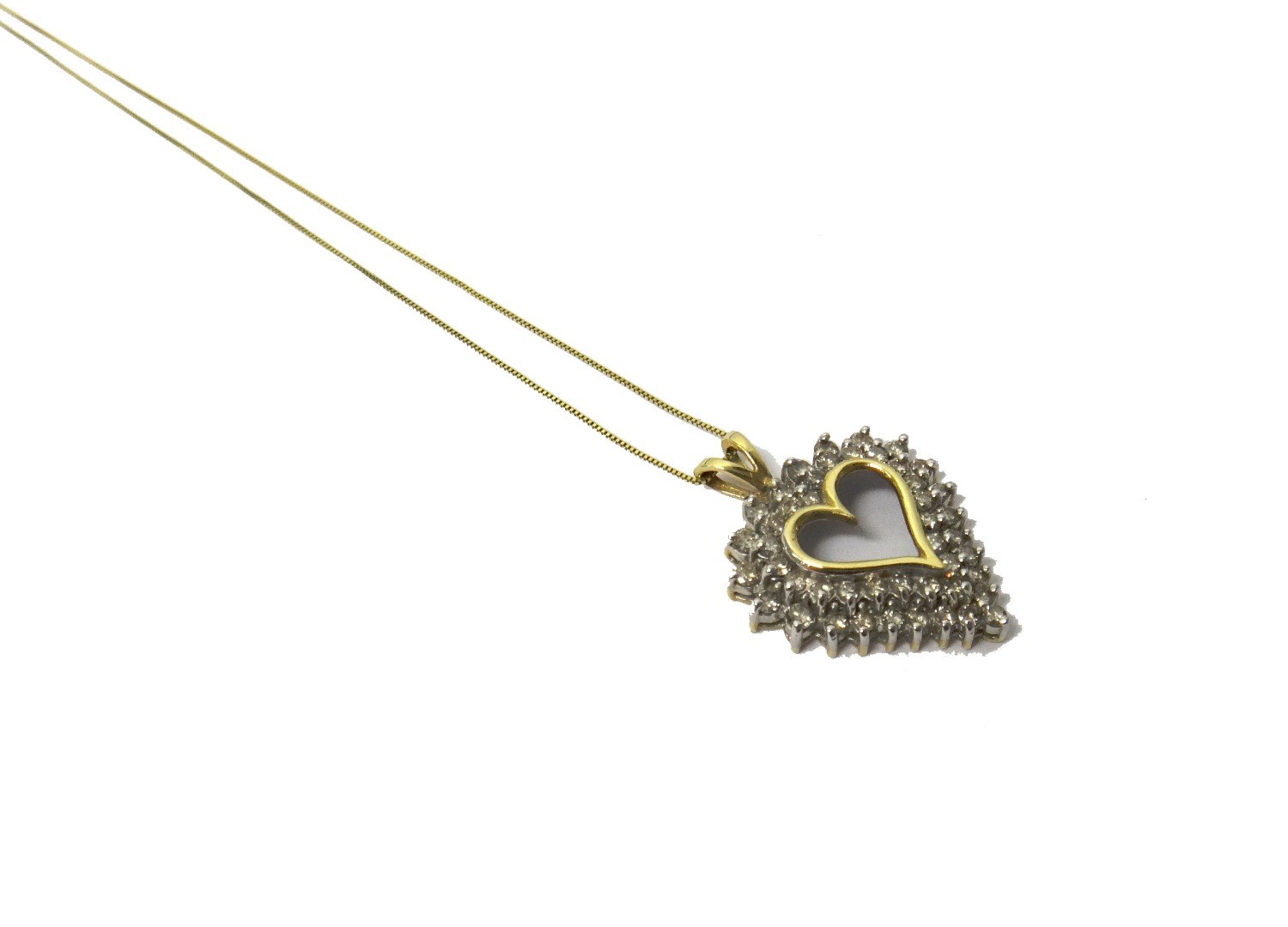 Appraisal: A gold and diamond set pendant pierced in an openwork