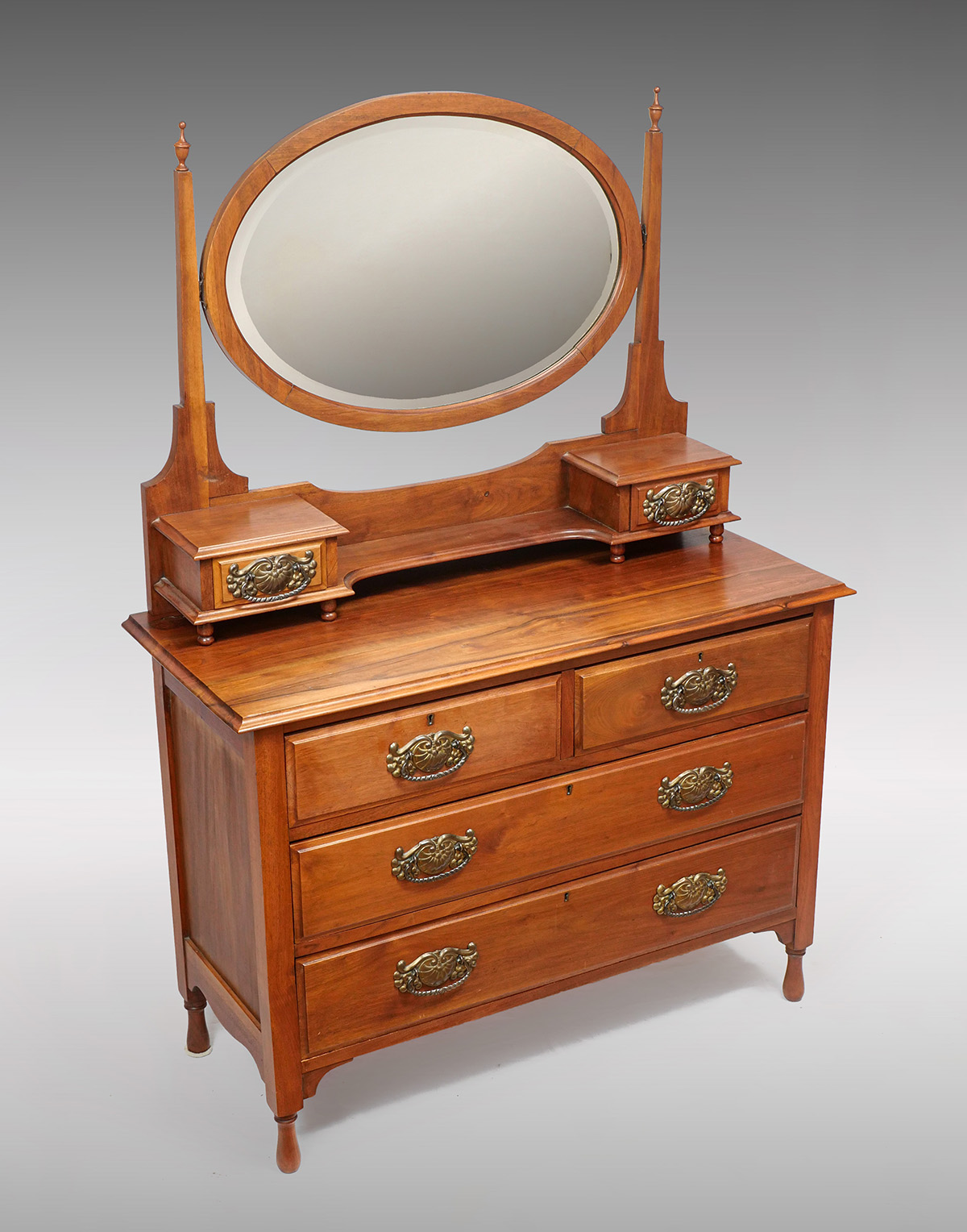 Appraisal: DRAWER MIRRORED DRESSER Oval beveled mirror flanked by turned urn