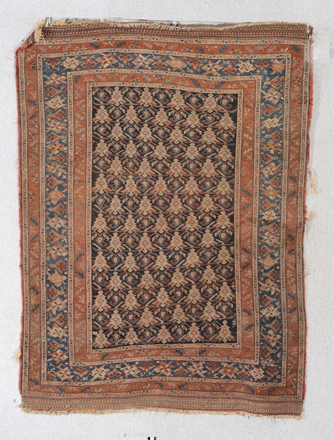 Appraisal: AN OLD AFSHAR BLUE GROUND RUG with a repetitive pattern