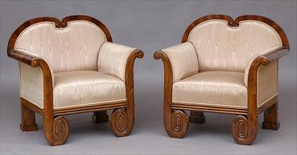 Appraisal: PAIR OF BIEDERMEIER CARVED AND MAHOGANY VENEERED BERGERES Each double