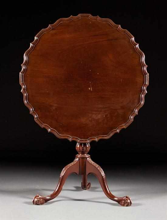 Appraisal: Biggs Chippendale style mahogany piecrust tilt-top tea table with ball