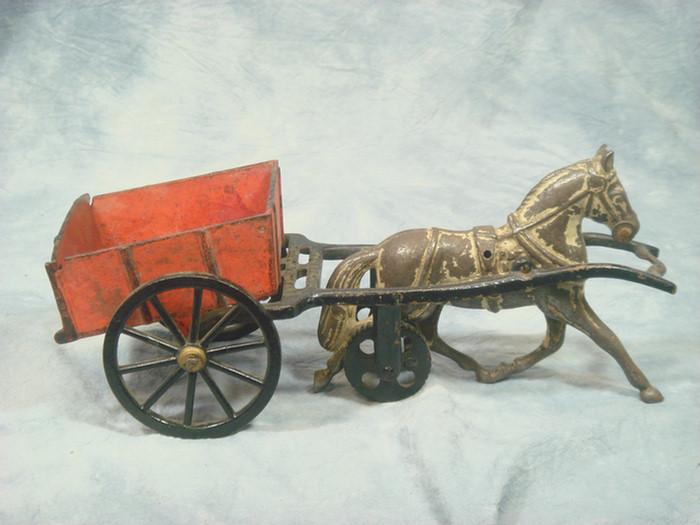 Appraisal: Cast iron toy horse drawn red cart frame stamped Pat