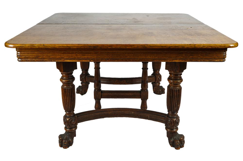 Appraisal: VICTORIAN CARVED OAK DINING TABLEwith eight leaves Condition with scuffs