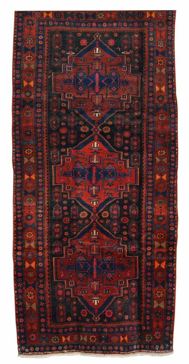 Appraisal: ORIENTAL RUG KURD HAMADAN ' x ' Three geometric medallions