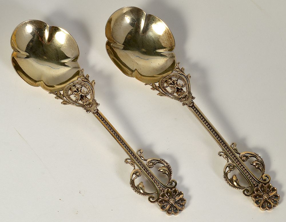 Appraisal: Pr Sterling Serving Spoons W Gold Wash Ornately designed handles