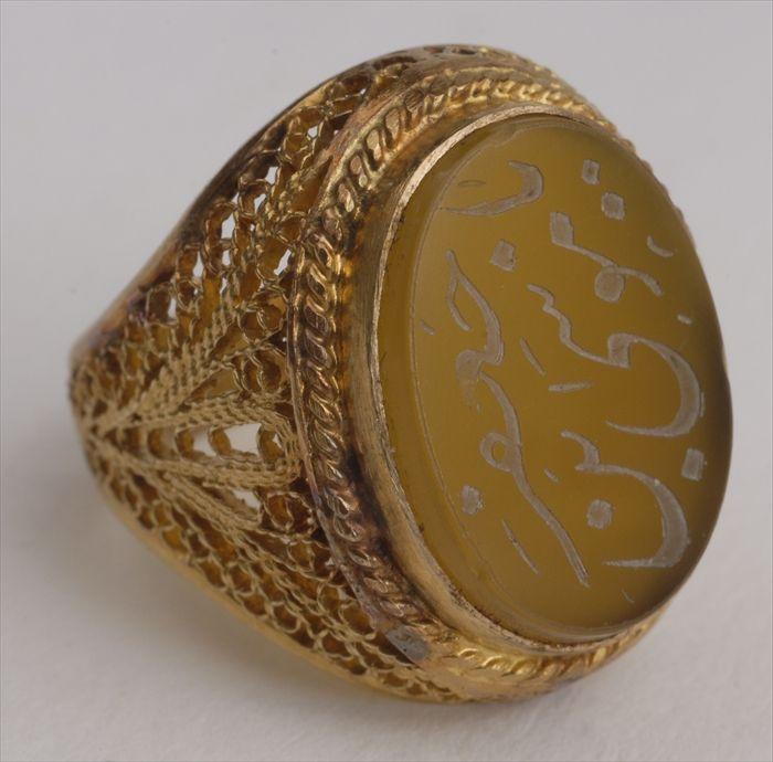 Appraisal: INSCRIBED HARDSTONE IN A GOLD FILIGREE MOUNT Approx size Provenance