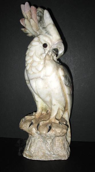 Appraisal: A tinted alabaster cockatoo third quarter th century height in