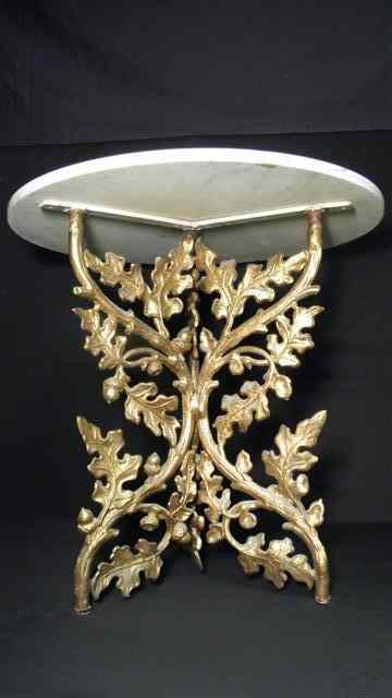 Appraisal: Round marble and iron accent table Leaf acorn pattern to