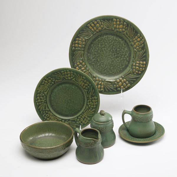 Appraisal: UNITED CRAFT Contemporary service for twelve in matte green speckled