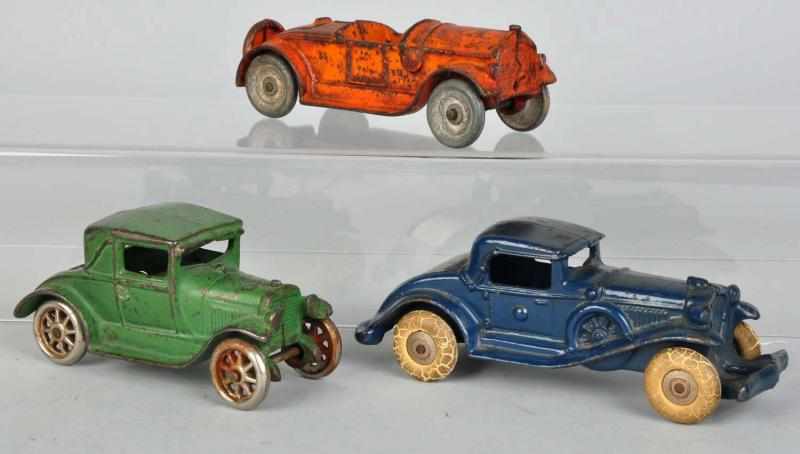 Appraisal: Lot of Cast Iron Automobile Toys American Includes one Champion